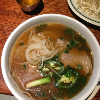 Basil Leaf Vietnamese Restaurant - Well- done steak pho with some sriracha added in. - Vietnamese Near Me - Albuquerque, New Mexico Basil Leaf Vietnamese Restaurant - Well- done steak pho with some sriracha added in. - Vietnamese Near Me - Albuquerque, New Mexico