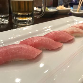 Aki Japanese Restaurant - Maguro toro (fatty tuna) and yellowtail nigiri. - Sushi Bars Near Me - Covington, Louisiana Aki Japanese Restaurant - Maguro toro (fatty tuna) and yellowtail nigiri. - Sushi Bars Near Me - Covington, Louisiana