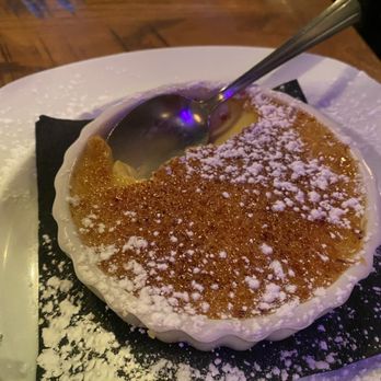 Firehouse Bar & Grill - a dessert on a plate with a spoon - New American Near Me - Egg Harbor City, New Jersey