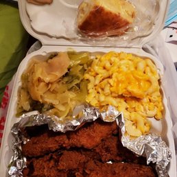 Fried catfish, mac & cheese, cabbage, and corn bread Fried catfish, mac & cheese, cabbage, and corn bread