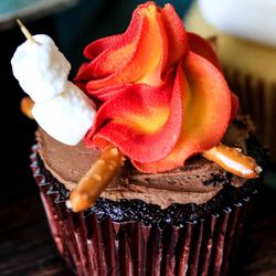 Love + Sugar - Freshly baked Campfire-themed cupcakes are the perfect touch to your camping-themed wedding reception.