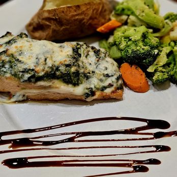 Mosca's Restaurant - Salmon Rockefeller with mixed veggies and baked potato - Pizza Near Me - Burlington, North Carolina Mosca's Restaurant - Salmon Rockefeller with mixed veggies and baked potato - Pizza Near Me - Burlington, North Carolina