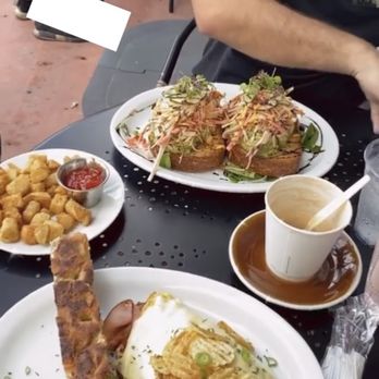 Bistro Cafe - Omelette tripleta & crab avocado toast with a side of potatoes - Breakfast & Brunch Near Me - Miami, Florida Bistro Cafe - Omelette tripleta & crab avocado toast with a side of potatoes - Breakfast & Brunch Near Me - Miami, Florida