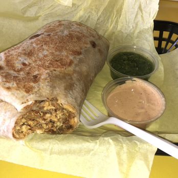 Curbgrill - Stuffed breakfast burrito with chorizo and steak. Super delicious!!! The green sauce adds a little heat - Breakfast & Brunch Near Me - Montrose , California