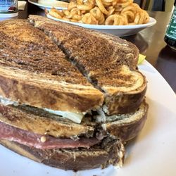 Country Cupboard - Ruben curly fries and chicken fried steak sandwich