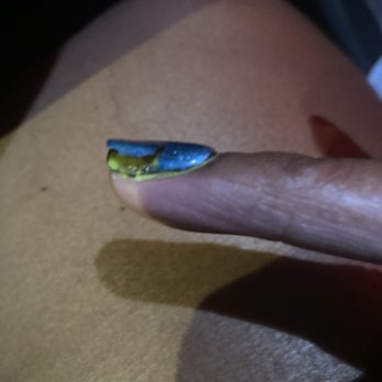 Heaven Nails - 24 hrs later dip nail with cat eye polish comes up. - Nail Salons Near Me - Lincoln, Nebraska