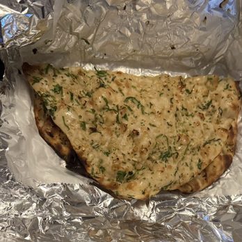 Saffron Indian Cuisine - Garlic Naan - Indian Near Me - Cary, North Carolina Saffron Indian Cuisine - Garlic Naan - Indian Near Me - Cary, North Carolina
