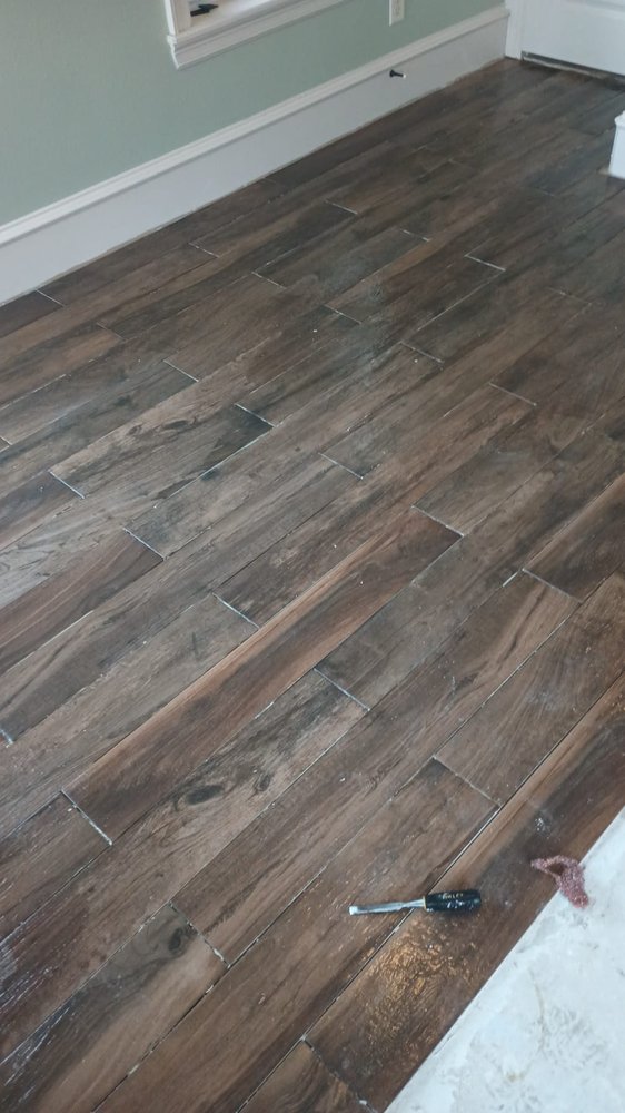 Slide of Reborn Roofing & Construction