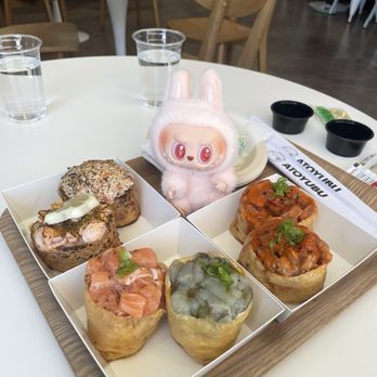 Atoyubu - Starting from the right: (2) spicy tuna, tako wasabi, fresh salmon, lemon pepper salmon, garlic butter crab - Korean Near Me - Walnut, California