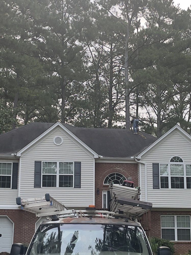 Slide of Ricky's Roofing