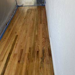 Hardwood floor repair and installation where our old fireplace used to be. Hardwood floor repair and installation where our old fireplace used to be.