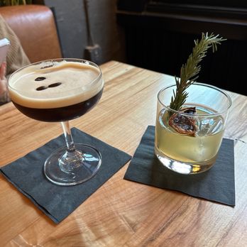 Re:bar - two cocktails on a wooden table - Cocktail Bars Near Me - Cleveland, Ohio