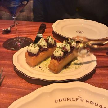 Chumley House - The Regal Potatoes topped with crispy pork belly and onion marmalade - Steakhouses Near Me - Fort Worth, Texas Chumley House - The Regal Potatoes topped with crispy pork belly and onion marmalade - Steakhouses Near Me - Fort Worth, Texas