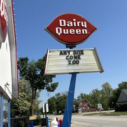 Dairy Queen Store - Current special. We stopped for large cones after the Romeo Memorial Day parade.