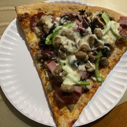 New York Pizzeria - Supreme Pizza slice