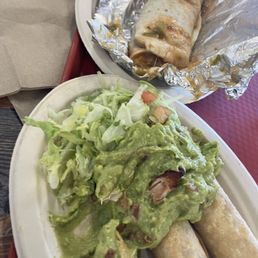 Flautas with Guac and A bean /cheese burrito with green chillies.