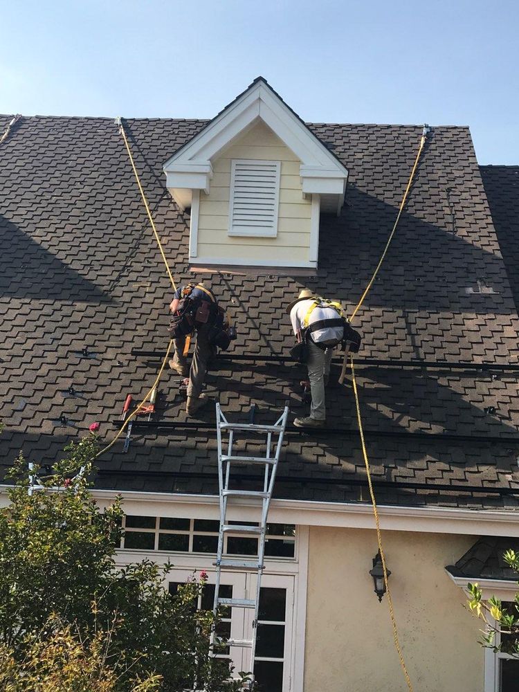 Slide of Dana Logsdon Roofing & Solar