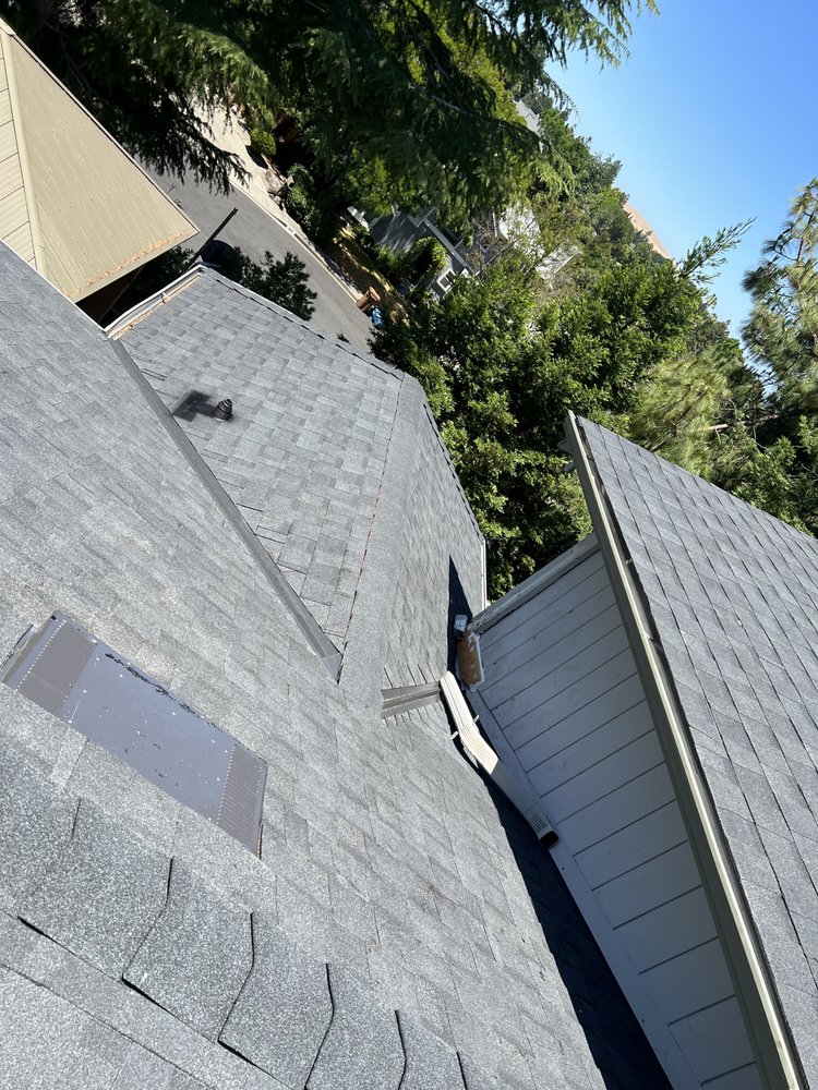 Slide of Israel Professional Roofer