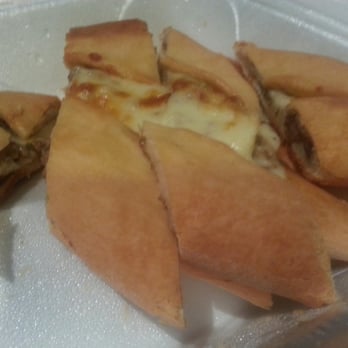 Kebab House - A very disheveled Kiymali Pide (Turkish stuffed pizza) - Mediterranean Near Me - Bensenville, Illinois