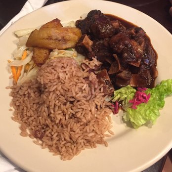 Footprints Cafe - Oxtail with rice and peas, cabbage and plantains. Delicious! - Caribbean Near Me - Brooklyn, New York