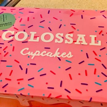 Colossal Cupcakes - North Olmsted - a close up of a pink cake with sprinkles - Bakeries Near Me - North Olmsted, Ohio Colossal Cupcakes - North Olmsted - a close up of a pink cake with sprinkles - Bakeries Near Me - North Olmsted, Ohio