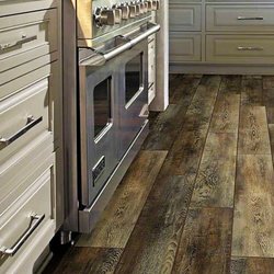 Stevens Carpet Plus - The beauty of wood without all the maintenance.  Waterproof plank flooring.