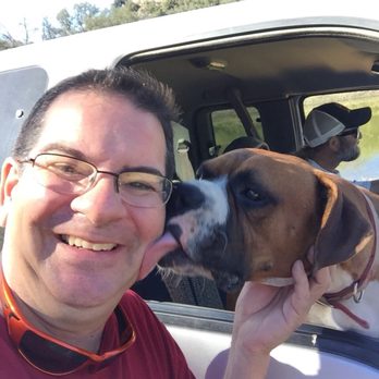 Star B Ranch - a man and his dog in the back of a truck - Meat Shops Near Me - Ramona, California