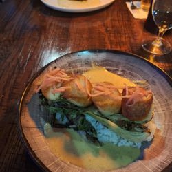 Three Embers Restaurant - Sea scallops with bok choy, rice, sauce and pickled fennel.