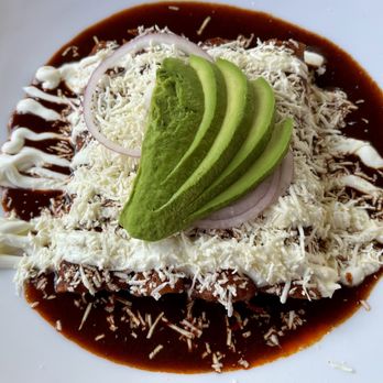 El Vigia - Enchiladas with molé, cheese and avocado. - Mexican Near Me - Zihuatanejo, GRO El Vigia - Enchiladas with molé, cheese and avocado. - Mexican Near Me - Zihuatanejo, GRO