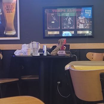 Buffalo Wild Wings - This is the table where the random employee would come and go - Sports Bars Near Me - Lexington Park, Maryland Buffalo Wild Wings - This is the table where the random employee would come and go - Sports Bars Near Me - Lexington Park, Maryland