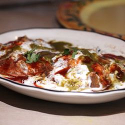 Kohinoor Indian Restaurant and Lounge - 6. Aloo Tikki Chat ($6.99) - smashed aloo tikki garnished with onion, yogurt, chutneys, tamarind, and chat masala