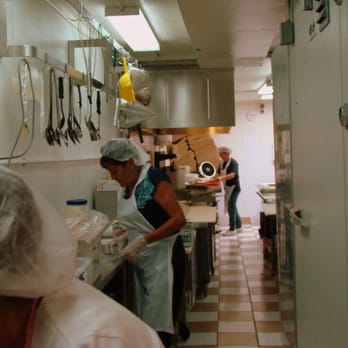 Michael's MiniMart - two women in a kitchen preparing food - Fast Food Near Me - Velarde, New Mexico Michael's MiniMart - two women in a kitchen preparing food - Fast Food Near Me - Velarde, New Mexico
