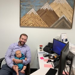 Kim Neyman, MD, FAAD - Elevation Dermatology - Dad and Carter hard at work!