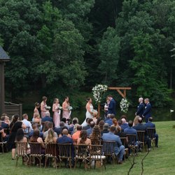 The Inn at Fox Briar Farm - Outdoor wedding with waterfront view.