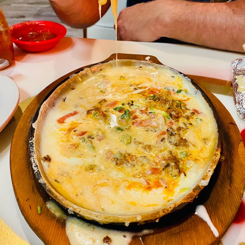 Vallarta Mexican Grill - Cheesy yummy gooey spicy chorizo Queso with pico! Yum yum yum :)... - Mexican Near Me - Pensacola, Florida Vallarta Mexican Grill - Cheesy yummy gooey spicy chorizo Queso with pico! Yum yum yum :)... - Mexican Near Me - Pensacola, Florida