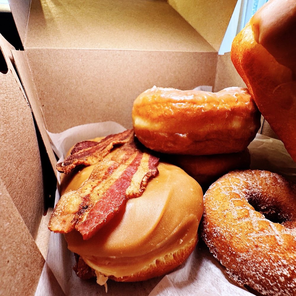 Voodoo Doughnut - Bacon Maple Bar, Cinnamon Sugar Cake, Raised Glazed - Donuts Near Me - Seattle, Washington Voodoo Doughnut - Bacon Maple Bar, Cinnamon Sugar Cake, Raised Glazed - Donuts Near Me - Seattle, Washington