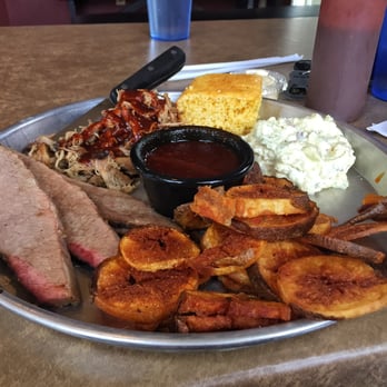 Piggyback BBQ - 2 meat platter (pulled pork and brisket) with buffalo chips and southern potato salad. Really good! - Barbeque Near Me - Whitefish, Montana Piggyback BBQ - 2 meat platter (pulled pork and brisket) with buffalo chips and southern potato salad. Really good! - Barbeque Near Me - Whitefish, Montana