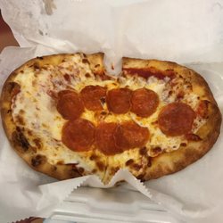 Jazzy's Burgers, Pizza & Pasta - This isnt even a flat container, its a regular togo box. All the shit sank to the middle, and it cost me $10 Seriously...just close down