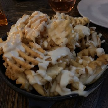 Philomena - Waffle fries with cheese sauce - Pizza Near Me - Oakland, California Philomena - Waffle fries with cheese sauce - Pizza Near Me - Oakland, California