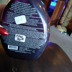 Hot Bodies Tanning Salon - Sitting on the sofa in the waiting area while the girl got my stand up capsule ready