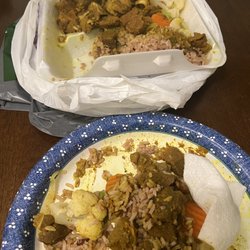 Flames Restaurant - Spoiled curry goat, rice and peas w/ mixed vegetables. Worst ever!