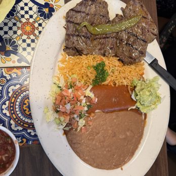 Tequila's Bar & Grill - Carne Asada with cheese Enchilada. Rice, and beans - Mexican Near Me - Van Nuys, California Tequila's Bar & Grill - Carne Asada with cheese Enchilada. Rice, and beans - Mexican Near Me - Van Nuys, California