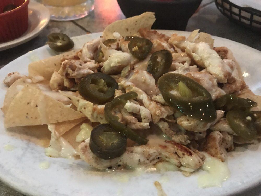 Order Nachos Grilled Chicken food online from Amigo Joe's Mexican Restaurant and Cantina store, St. Louis on bringmethat.com