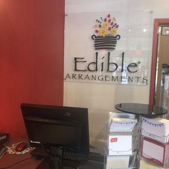 Edible Arrangements - the front desk of a business - Gift Shops Near Me - Fresno, California