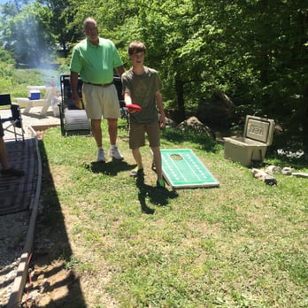 Auburn RV Park - Picnic table, grill and still room for cornhole - Campgrounds Near Me - Auburn, Alabama