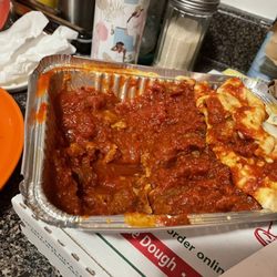 Tortorice's Pizza - I ate the eggplant on the left side of the pan - that's all the sauce that was left after I took out the eggplant.