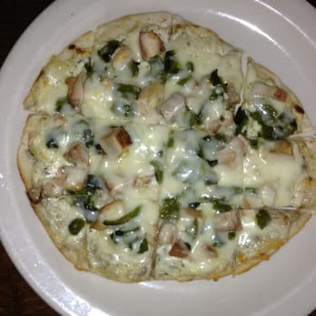 Cassidy's Restaurant and Bar - Smoked chicken flatbread with cotija cheese and poblano chile - New American Near Me - Portland, Oregon Cassidy's Restaurant and Bar - Smoked chicken flatbread with cotija cheese and poblano chile - New American Near Me - Portland, Oregon