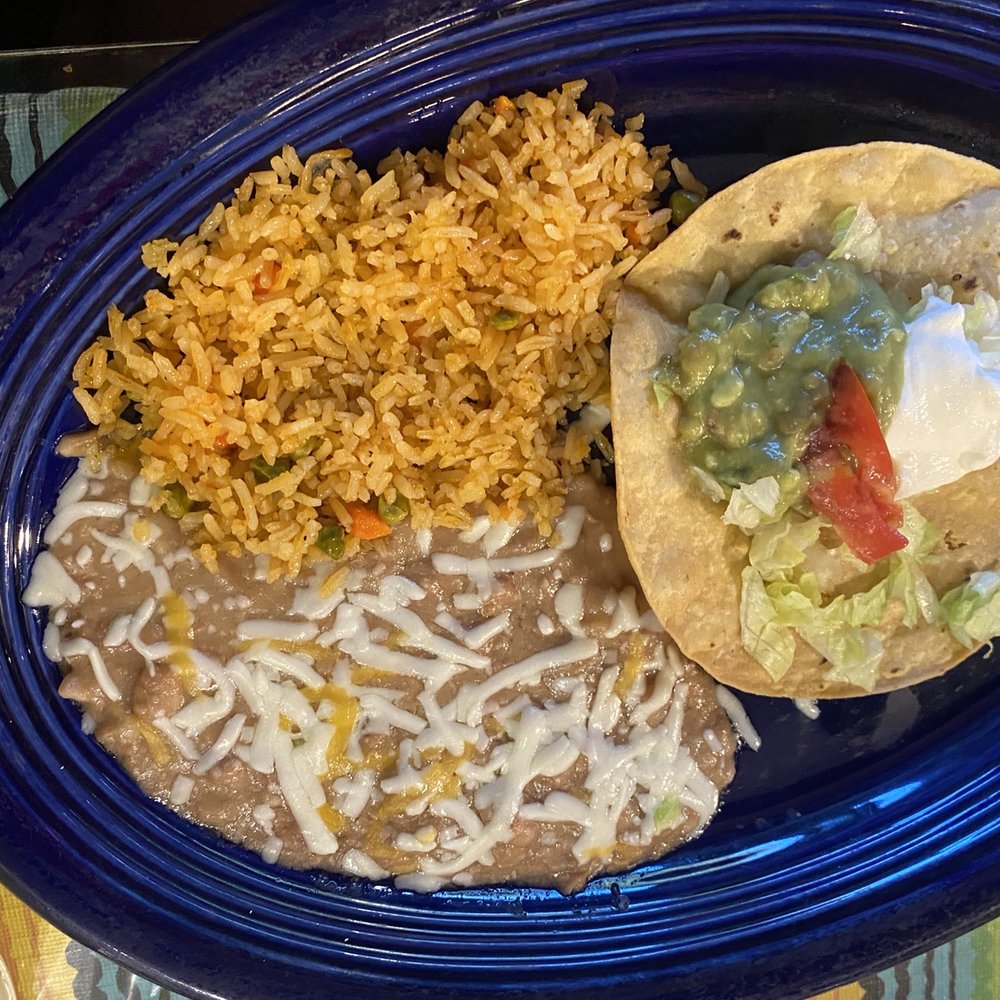 Rice and Beans and toppings that came with the Shrimp Fajitas Rice and Beans and toppings that came with the Shrimp Fajitas