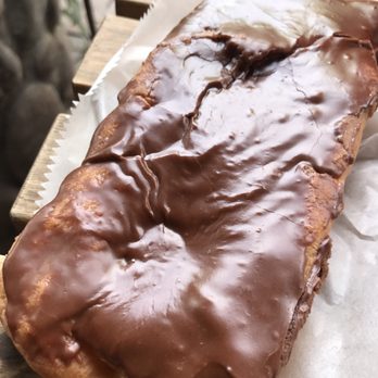 La Estrella Bakery - Half for me n half for my hubby- chocolate long john - Bakeries Near Me - Tucson, Arizona