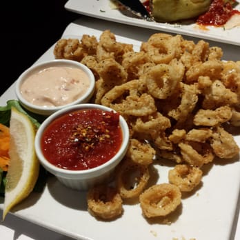 Cafe Toscano - Calamari Fitting - Light breading with Delious dipping sauces - Italian Near Me - Aurora, Ohio